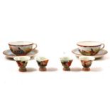 Set of four Japanese erotic shinga sake cups and a pair of Kutani cups,