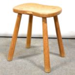 Arts & Crafts oak saddle-seat stool, by Robert 'Mouseman' Thompson of Kilburn.