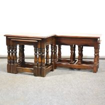 Two nests of oak occasional tables,