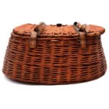 A vintage wicker fishing creel, possibly a Hardy Bros 'Houghton' model