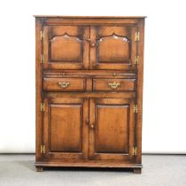 Oak drinks cabinet by Titchmarsh & Goodwin,