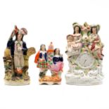 Collection of Staffordshire pottery figures,