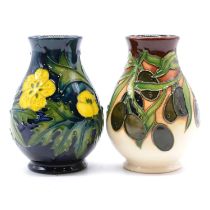 Moorcroft Pottery, two small vases in the 'Buttercup' and 'Olives' designs