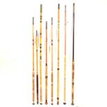 Eight assorted split cane fly fishing and sea fishing rods