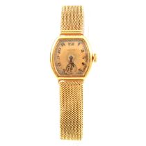 Zenith - a lady's gold bracelet watch.