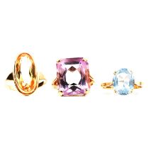 Three gemset dress rings, amethyst, citrine and synthetic blue spinel.
