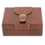 A Rolex brown leather watch box with buckle.