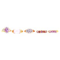 Eight purple gemstone rings, natural and synthetic gemstones.