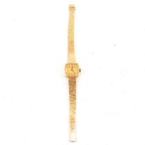 Bueche Girod - a lady's 9 carat yellow gold bracelet watch.