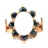 A 1970’s opal and sapphire cluster ring.