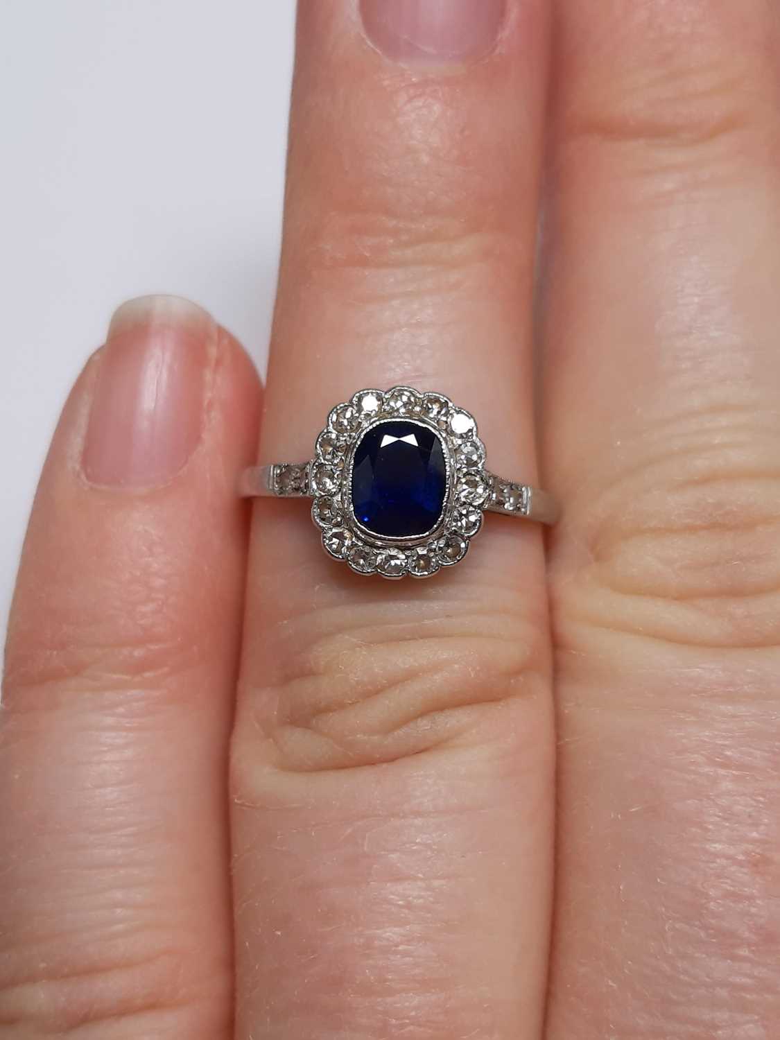 A sapphire and diamond cluster ring. - Image 4 of 5