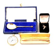 Silver pencil, medallion, tie pins, spoon, napkin ring and nickel pocket watch.