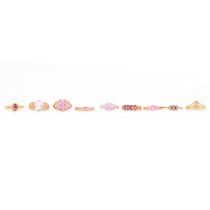 Nine pink and red gemstone rings, natural and synthetic gemstones.
