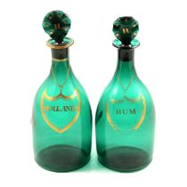 Two 19th century green glass decanters, HOLLANDS and RUM