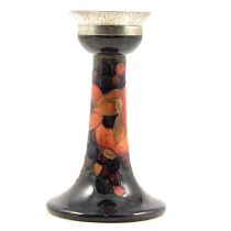 William Moorcroft for Liberty & Co, a Pomegranate design candlestick