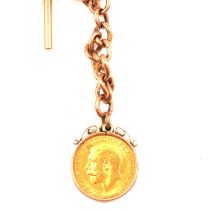George V gold Sovereign coin, on a watch chain with T-bar,