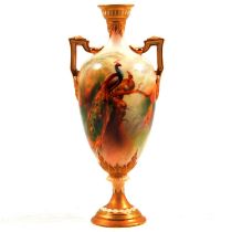 Royal Worcester twin handled vase painted with peacock and hen.