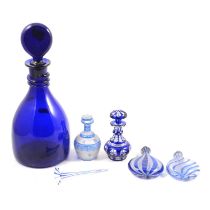 Two Nailsea type flasks; bristol blue decanter; two other items of blue decorative glass.