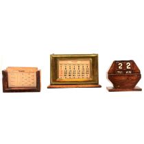 Small collection of desk top perpetual calendars,