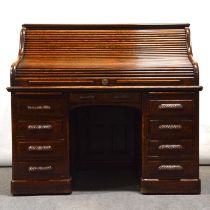 Oak roll top desk, Maple & Co,.