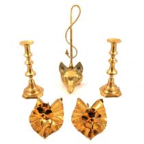 Brass fox mask door stop, pair of candlesticks, pair of girandole and a coaching horn,