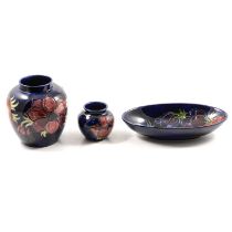 Moorcroft Pottery - Anemone pattern ginger jar, small vase and dish.