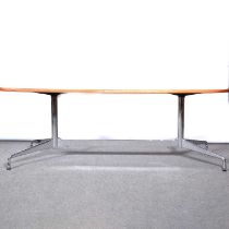 Y Rosewood and chrome oval dining table, designed by Charles and Ray Eames for Herman Miller