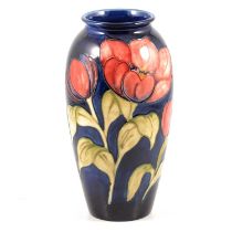 Walter Moorcroft for Moorcroft Pottery, an ovoid vase in the Tulips design.