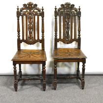 Pair of carved oak hall chairs