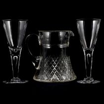 Set of ten conical wine glasses, and a water jug