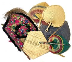 Collection of woven Ethnic rigid fans, basketwork, and a fly whist.