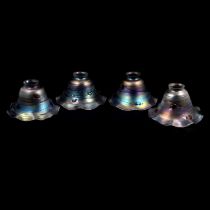 A set of four Art Nouveau style glass lamp shades