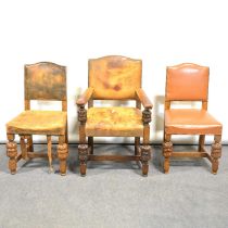 Eleven leather upholstered oak dining chairs