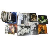 David Bowie memorabilia, including books, tour programmes and pictures.