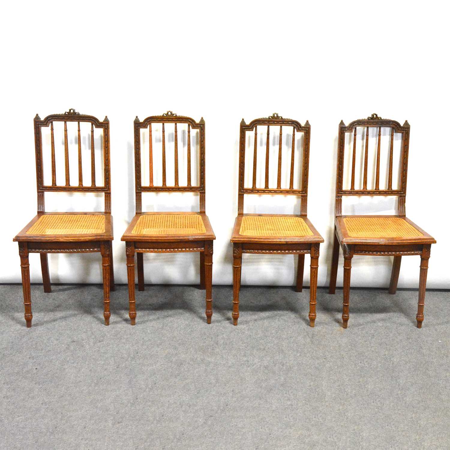 Set of six French oak dining chairs,