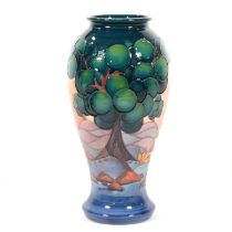 Sally Tuffin for Moorcroft a baluster vase in the Mamoura landscape design.