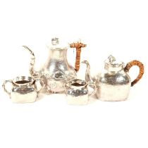 Chinese silver matched three piece tea set and an associated hot water pot,