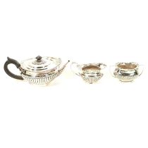 Silver matched three piece tea set,