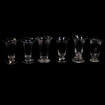 A collection of six jelly glasses