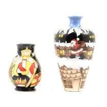 Moorcroft Pottery, two Christmas themed trial vases