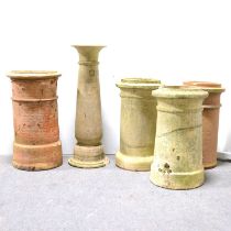 Pair of terracotta chimney pots and three others,