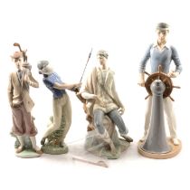 Five Lladro and Nao figurines.