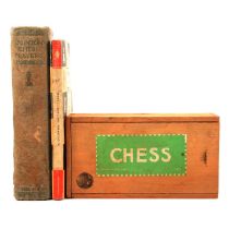 Four chess sets and two books,