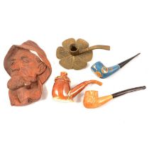 A collection of pipes and other smoking related items.