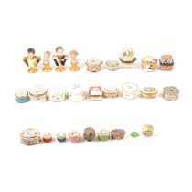 A collection of enamel and porcelain trinket boxes; and four Continental busts