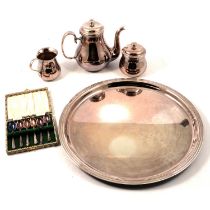 Eight Omani white metal napkin rings, Cristofle silver-plated teaset and tray other plated wares.