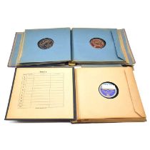 Two folders of 78 records, one record that appears to be signed by Louis Armstrong.