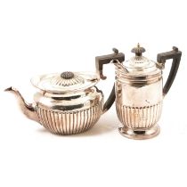 Silver teapot and hot water jug,