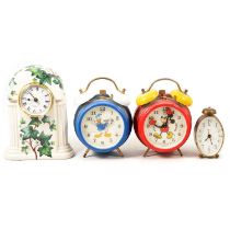 Various travel clocks, cartoon character alarm clocks,