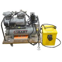 Gast air compressor vacuum pump.